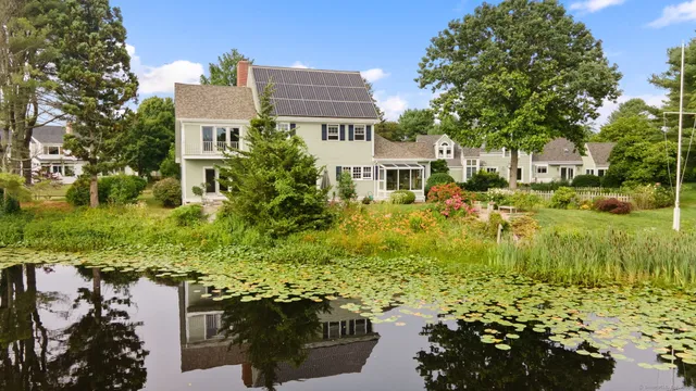 a view of a lake with a building in the background