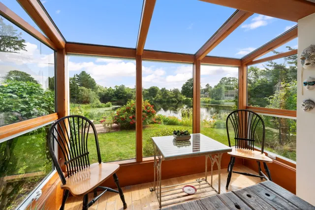a view of a two chairs in the deck