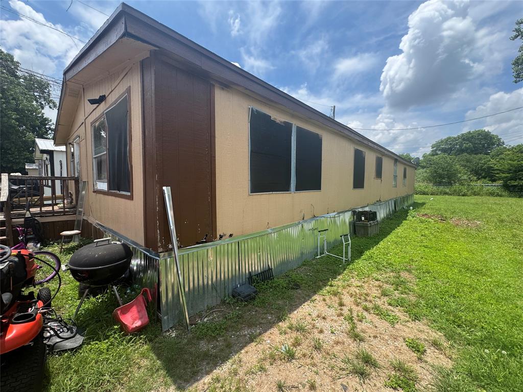 1614 Cole Road Bellmead, TX 76705 - Photo 21 of 21 Single-story residence featuring light-colored siding and a contrasting brown trim