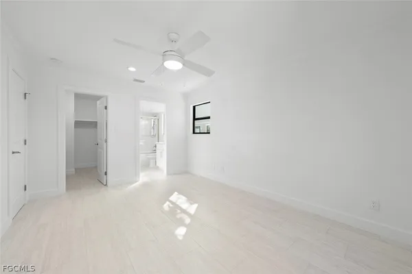 a view of an empty walk in closet