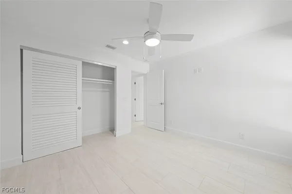 a utility room with sink dryer and washer