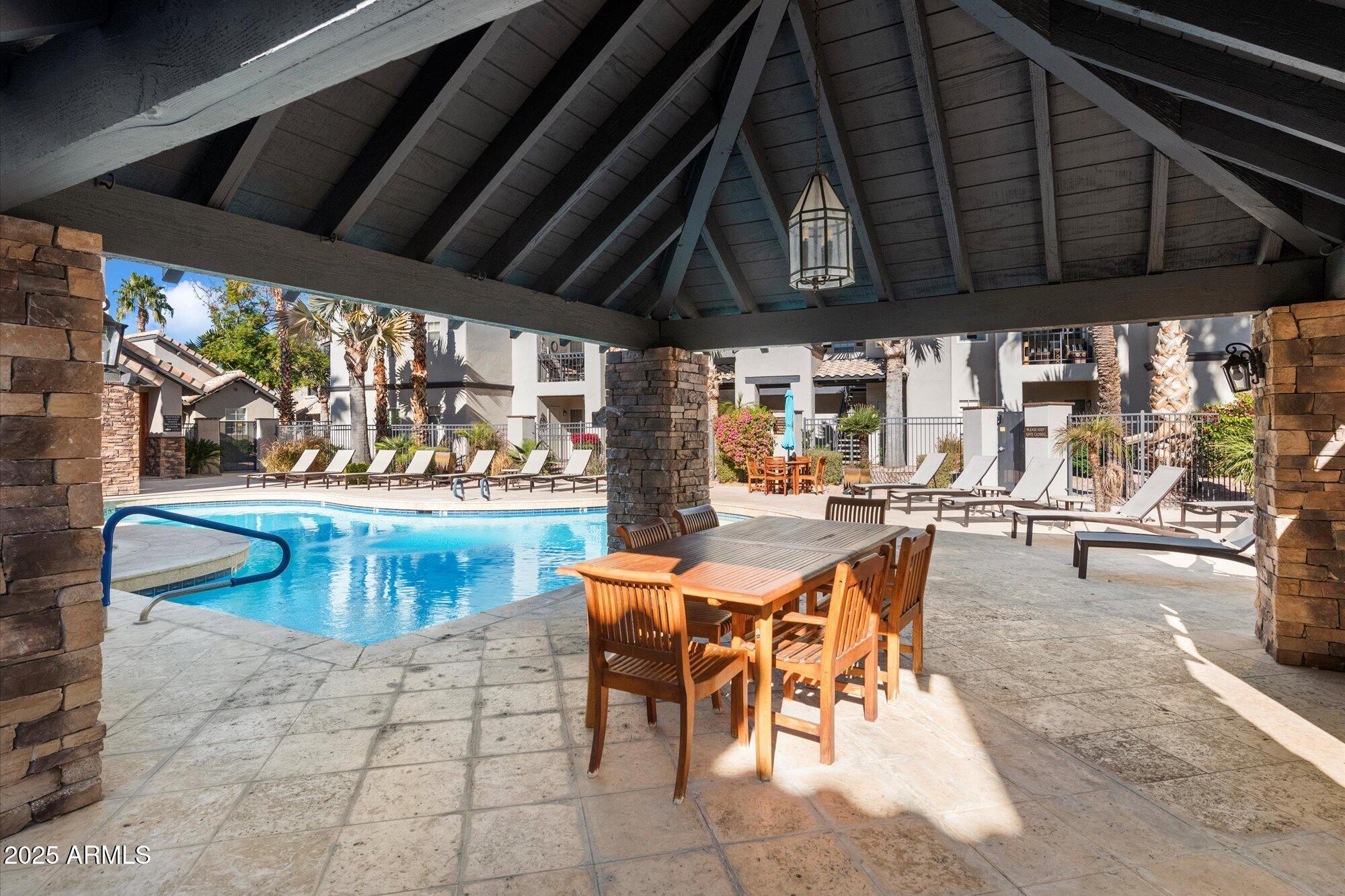 14145 North 92nd Street, Unit 2141 Scottsdale, AZ 85260 - Photo 35 of 38 Covered pool area