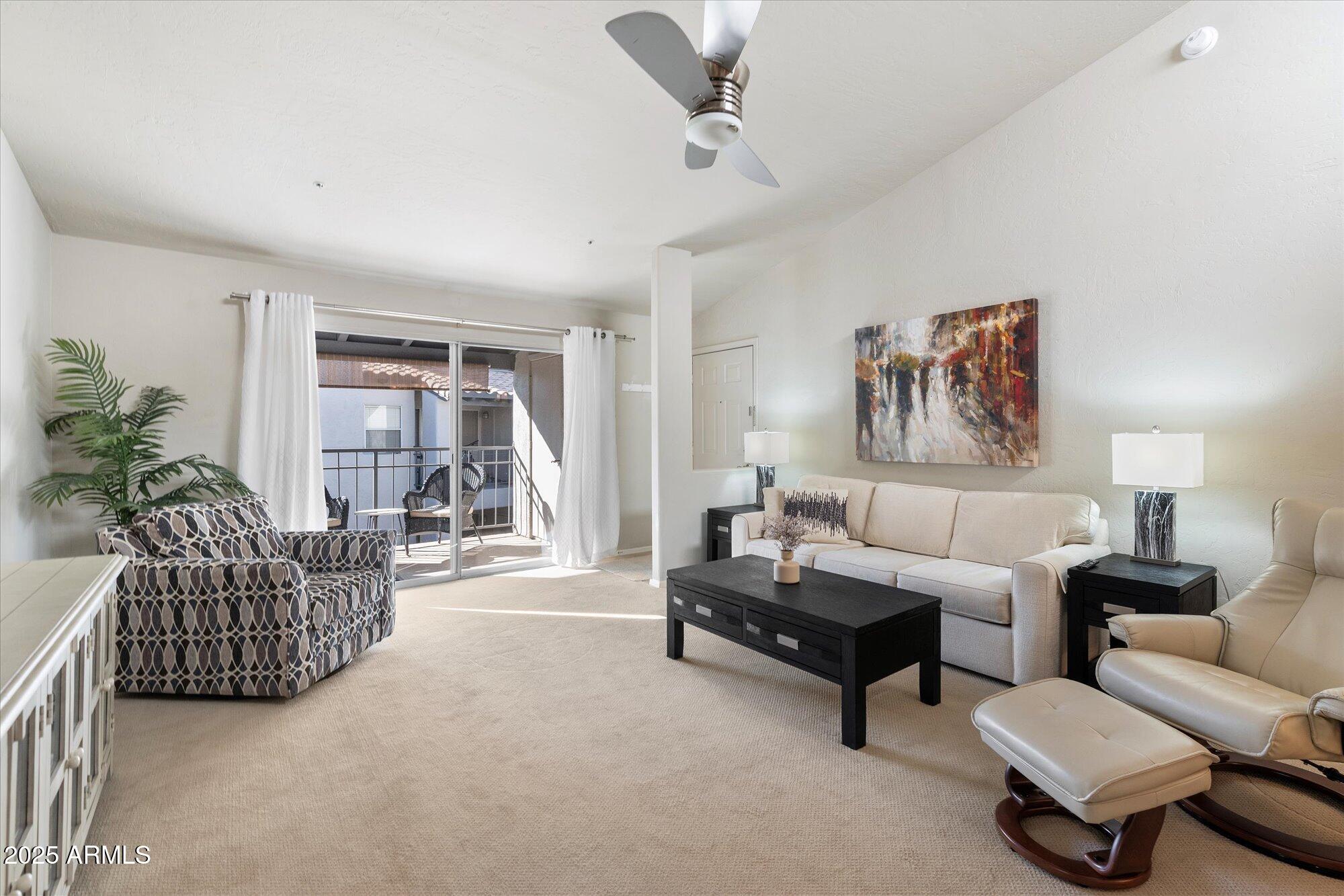 14145 North 92nd Street, Unit 2141 Scottsdale, AZ 85260 - Photo 7 of 38 Living room and balcony