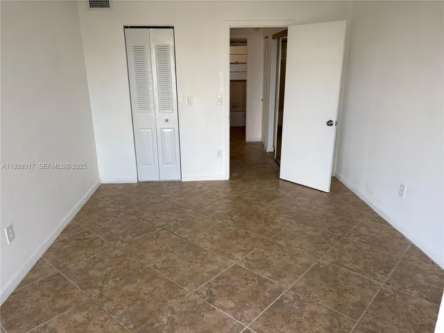 an empty room with closet