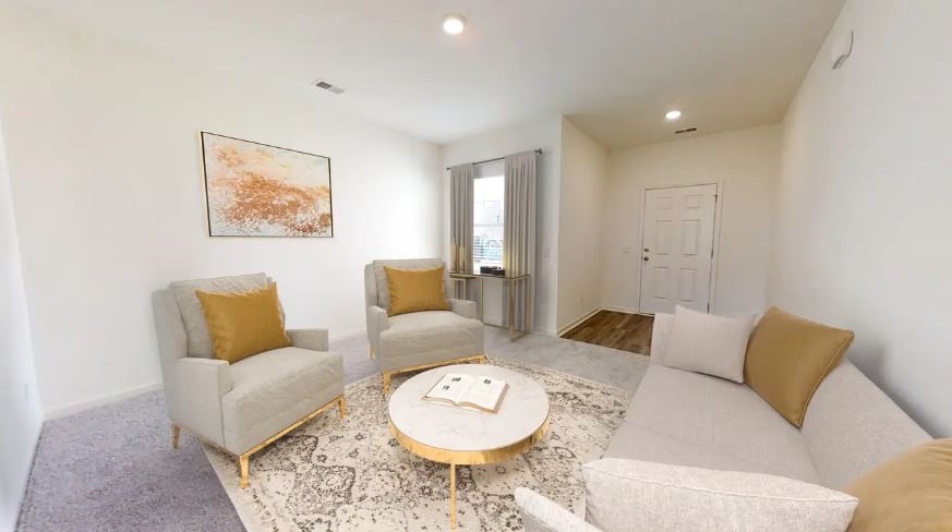 217 Rodgers Road Taylor, TX 76574 - Photo 5 of 13 a living room with furniture and a rug