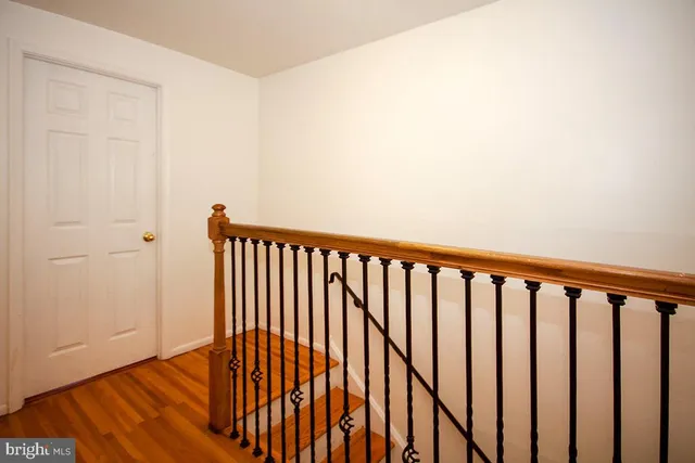 a view of a porch with wooden floor