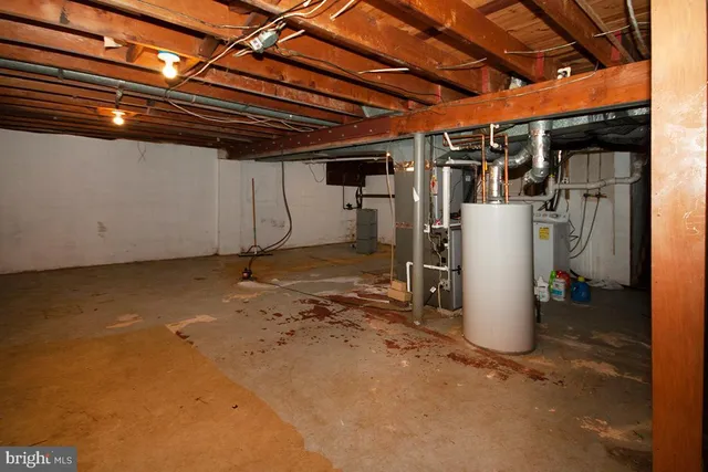 a view of a room with wooden walls