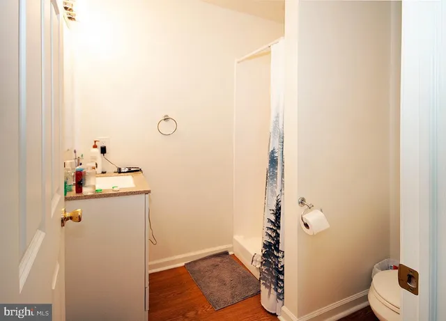 a bathroom with a sink and mirror