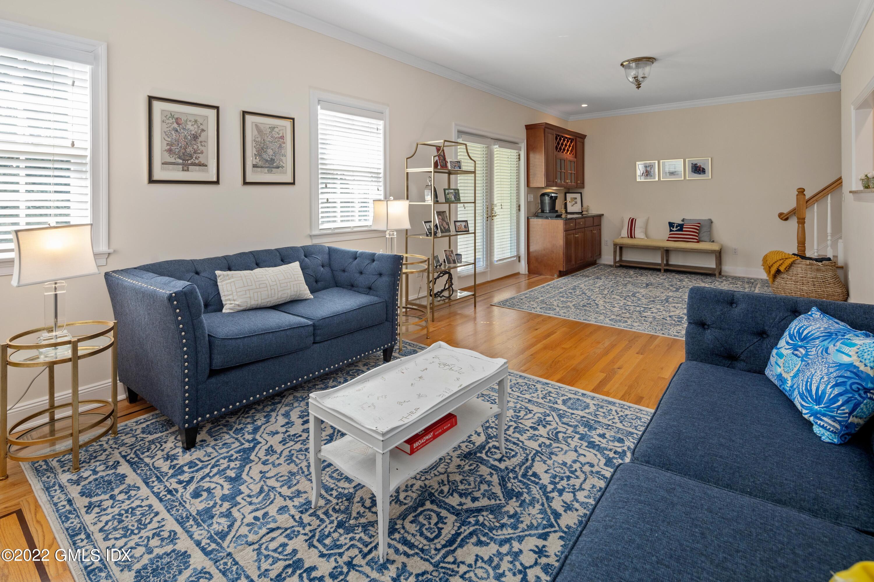 34 Windy Knolls, Unit B Greenwich, CT 06831 - Photo 14 of 37 a living room with furniture and a wooden floor
