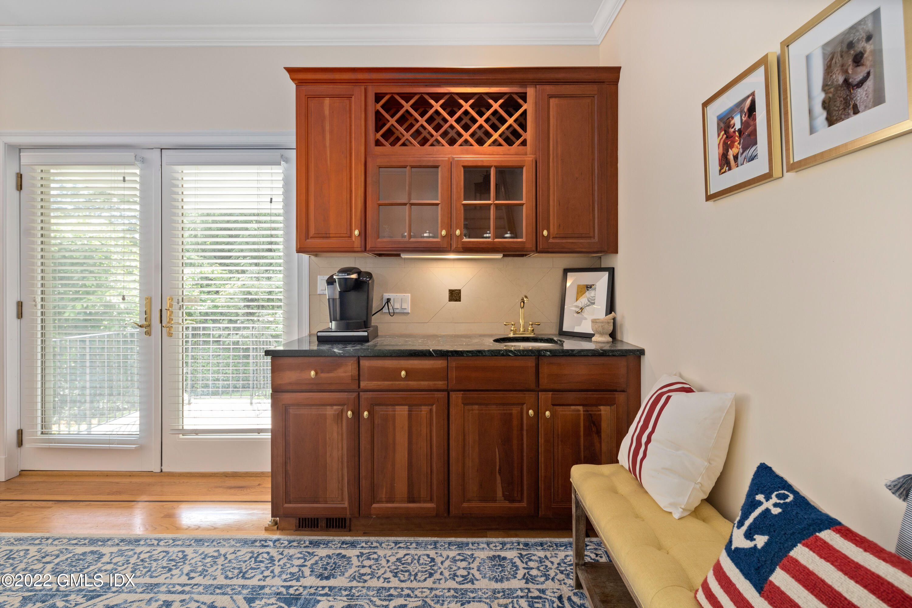 34 Windy Knolls, Unit B Greenwich, CT 06831 - Photo 17 of 37 a kitchen with stainless steel appliances granite countertop a stove a sink and a microwave