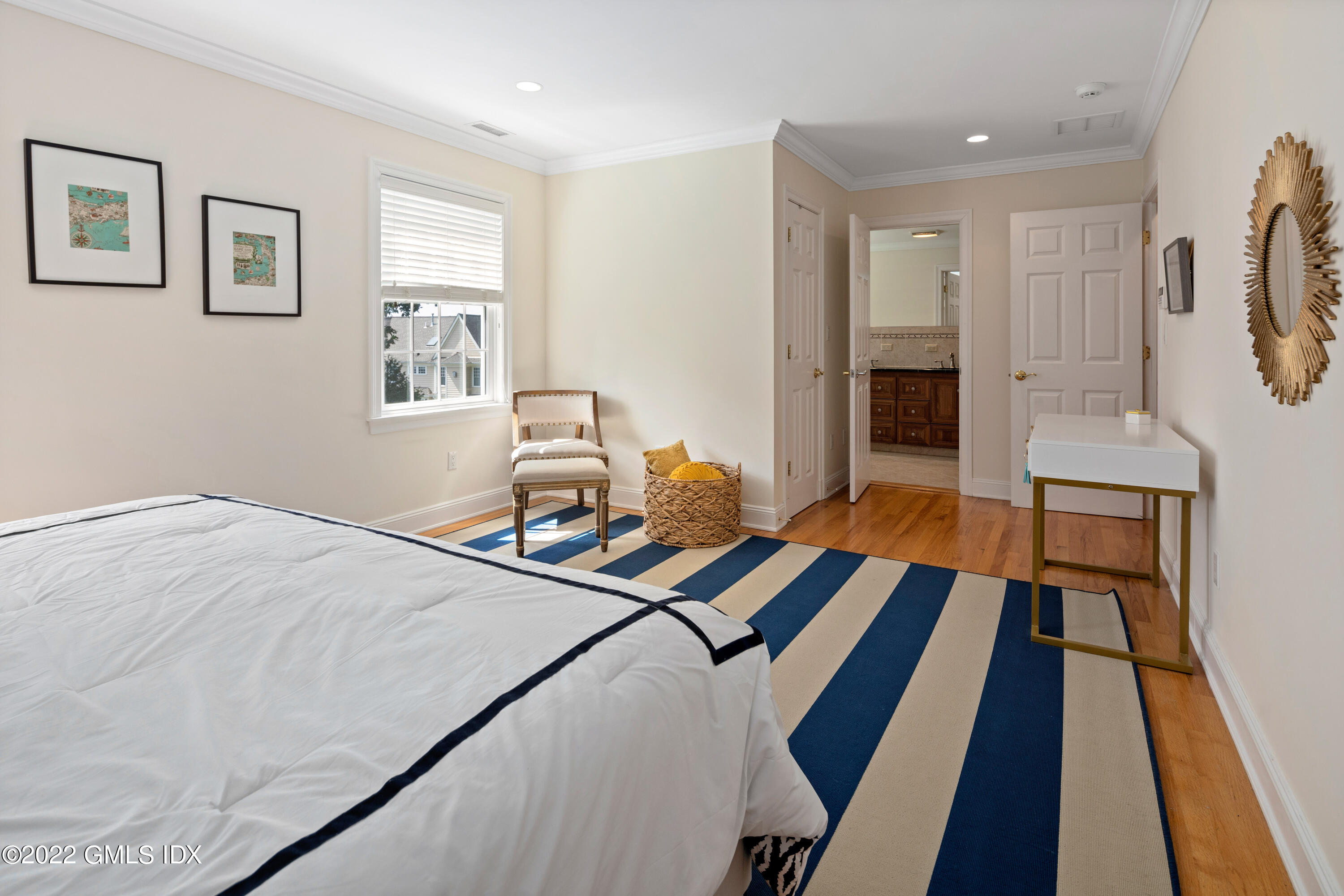 34 Windy Knolls, Unit B Greenwich, CT 06831 - Photo 26 of 37 a bed room with a bed and a television