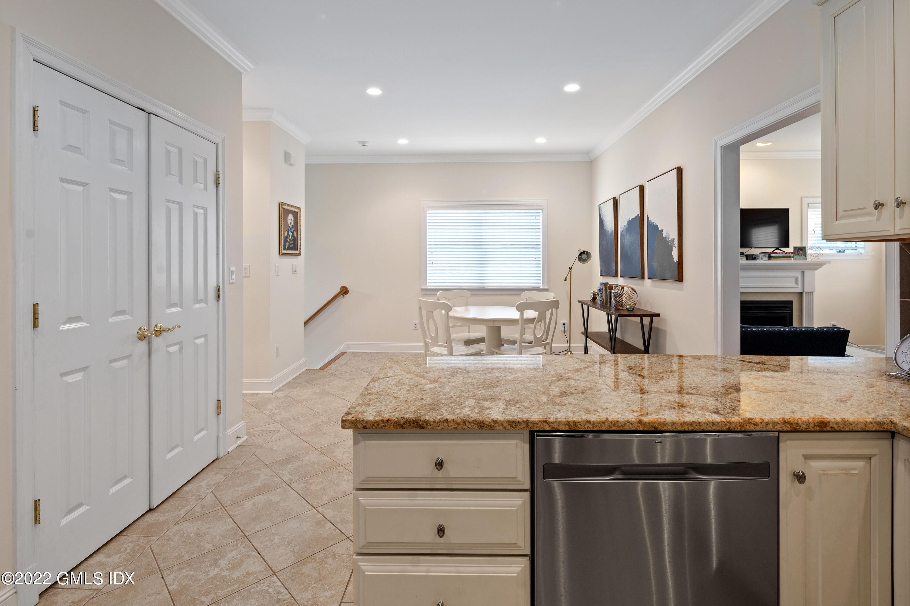 34 Windy Knolls, Unit B Greenwich, CT 06831 - Photo 6 of 37 a kitchen with granite countertop a sink a stove counter space and cabinets