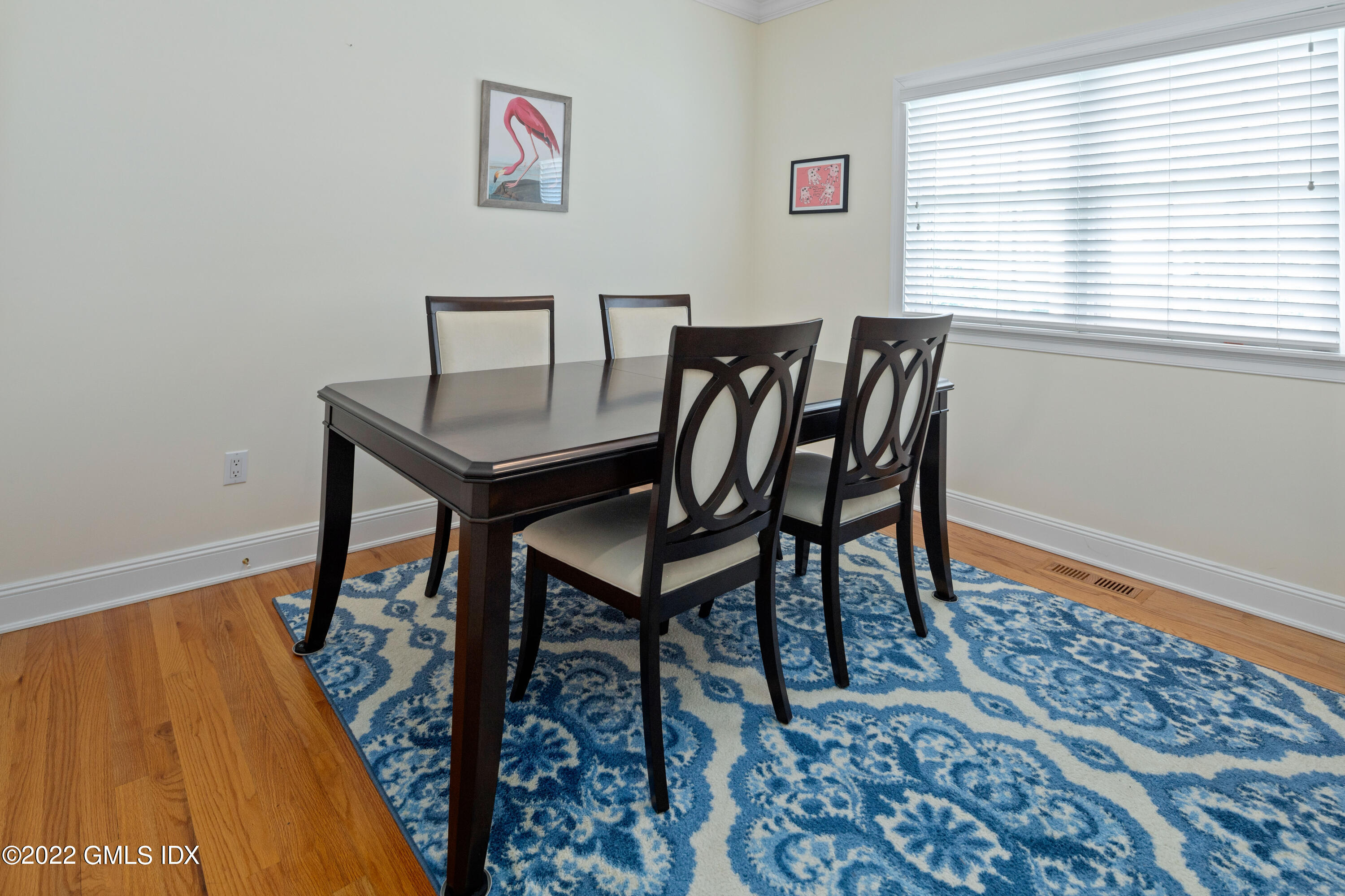 34 Windy Knolls, Unit B Greenwich, CT 06831 - Photo 10 of 37 a view of a workspace with furniture and a window