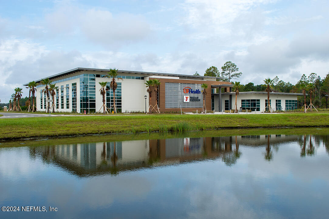 330 Salt Meadow Loop Yulee, FL 32097 - Photo 20 of 20 a view of house with outdoor space and lake view