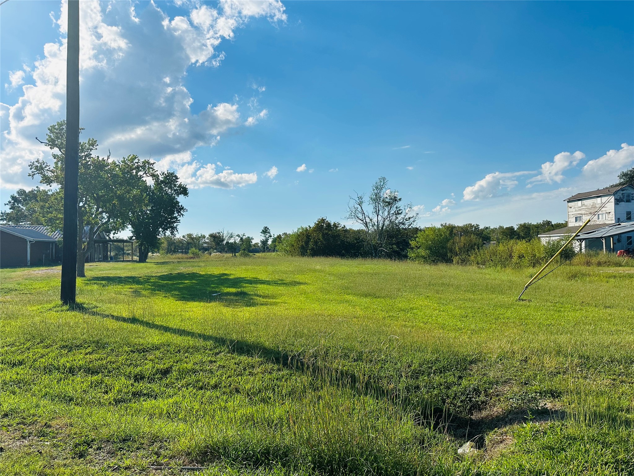 1414 Angle Road Angleton, TX 77515 - Photo 18 of 24 a view of an ocean yard and outdoor seating