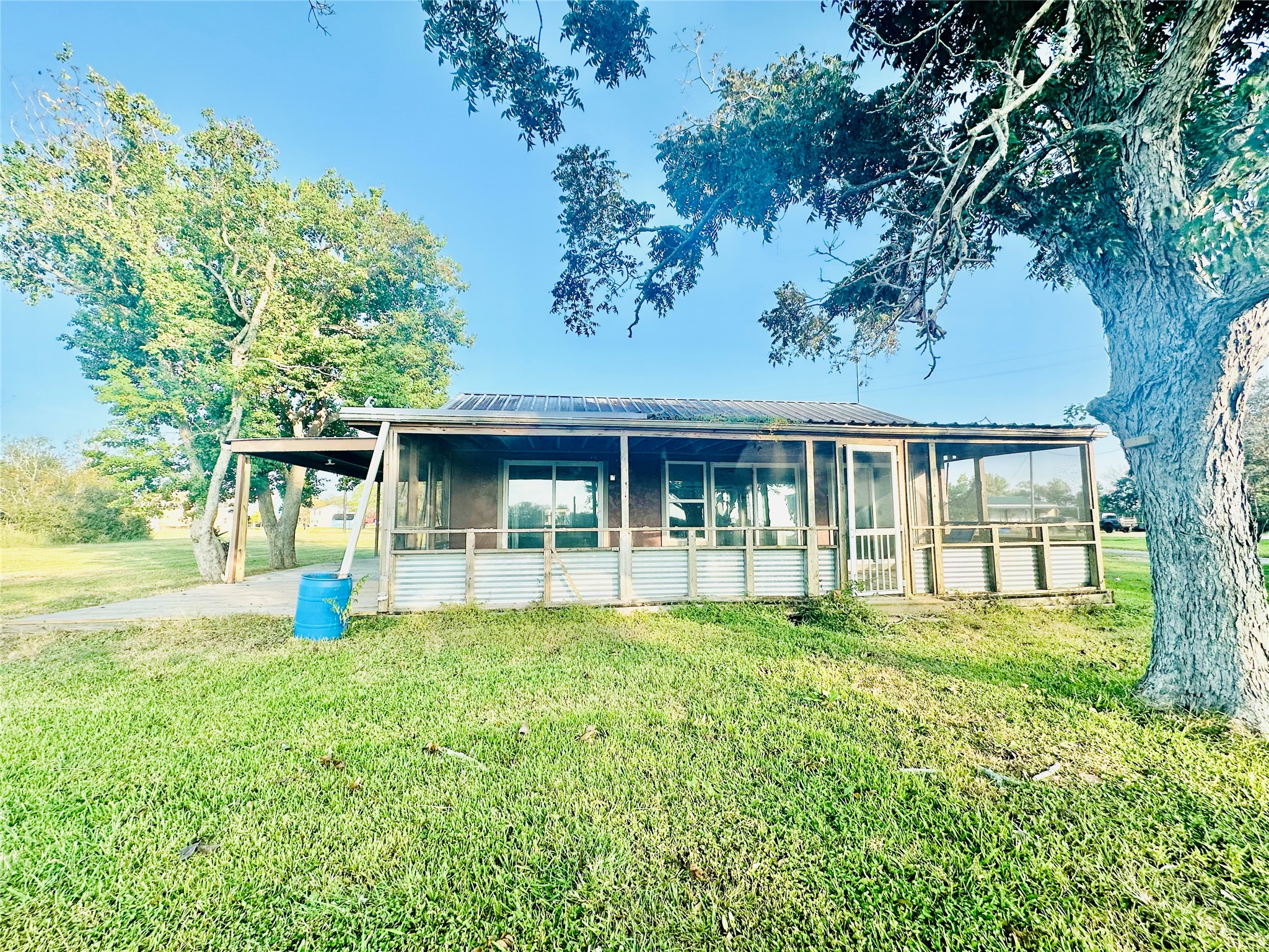 1414 Angle Road Angleton, TX 77515 - Photo 24 of 24 front view of a house with a yard