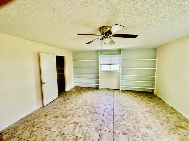 a view of a room with a bathroom