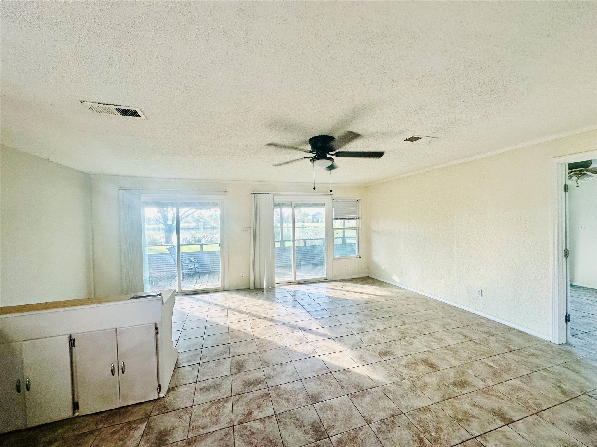 1414 Angle Road Angleton, TX 77515 - Photo 10 of 24 a view of an empty room with a window