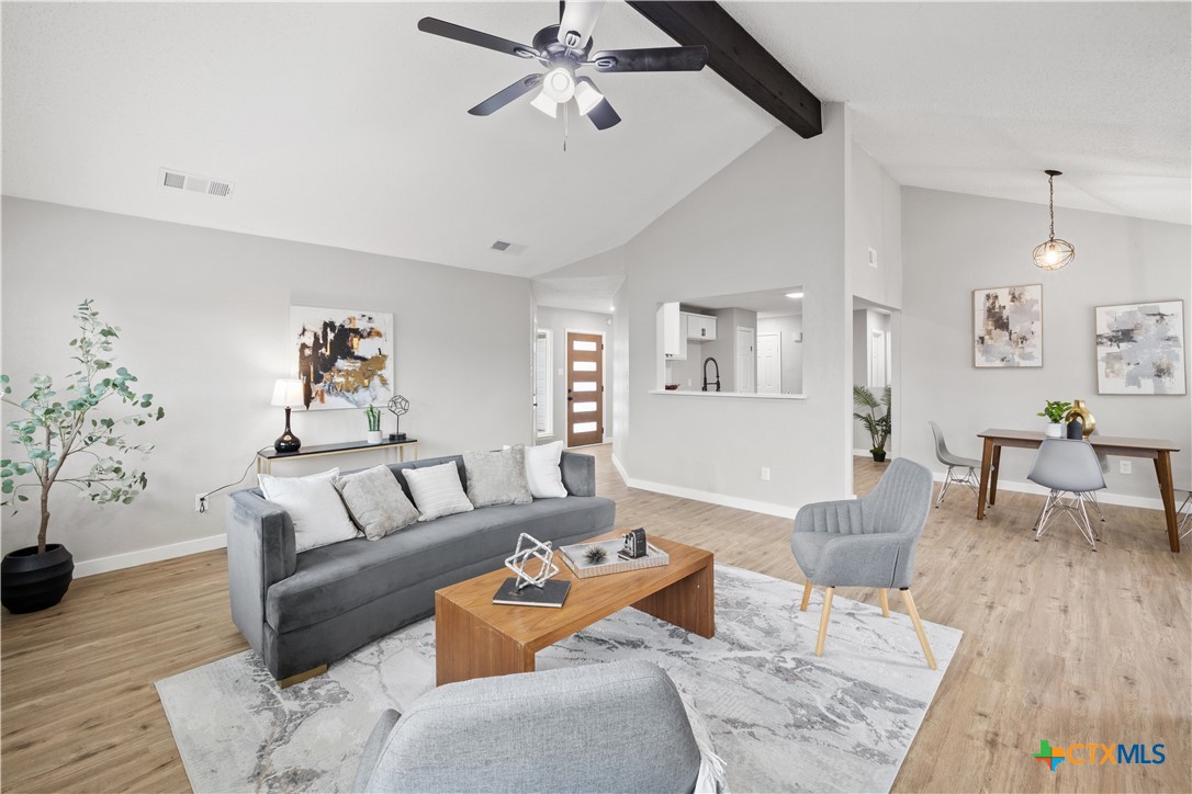 804 Antelope Trail Temple, TX 76504 - Photo 5 of 32 a living room with furniture and wooden floor