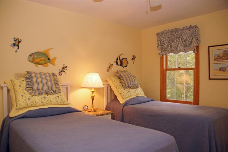 23 Dundee Circle Harwich, MA 02645 - Photo 14 of 23 a bedroom with a bed and a window