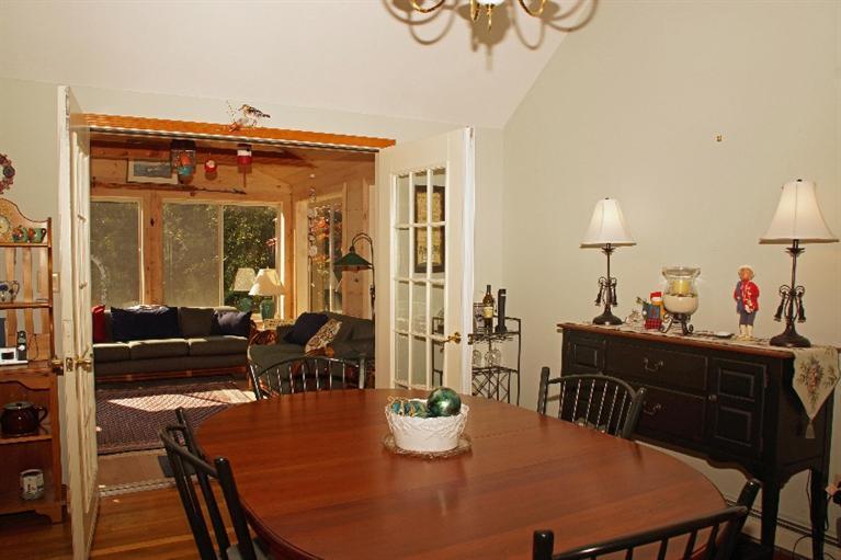 23 Dundee Circle Harwich, MA 02645 - Photo 6 of 23 a view of a dining room with furniture and wooden floor