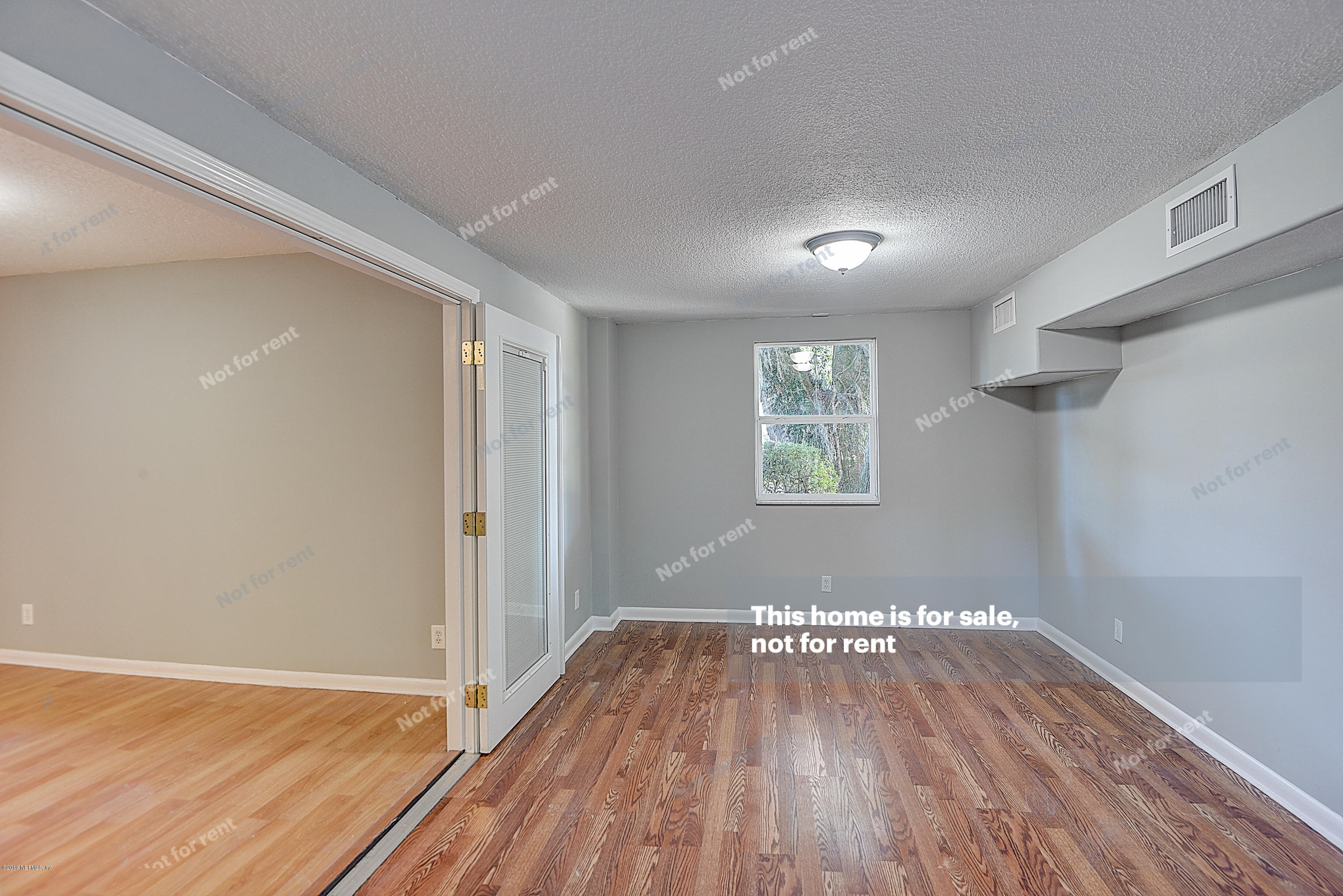 1152 Crown Drive Jacksonville, FL 32221 - Photo 11 of 31 a view of empty room with wooden floor