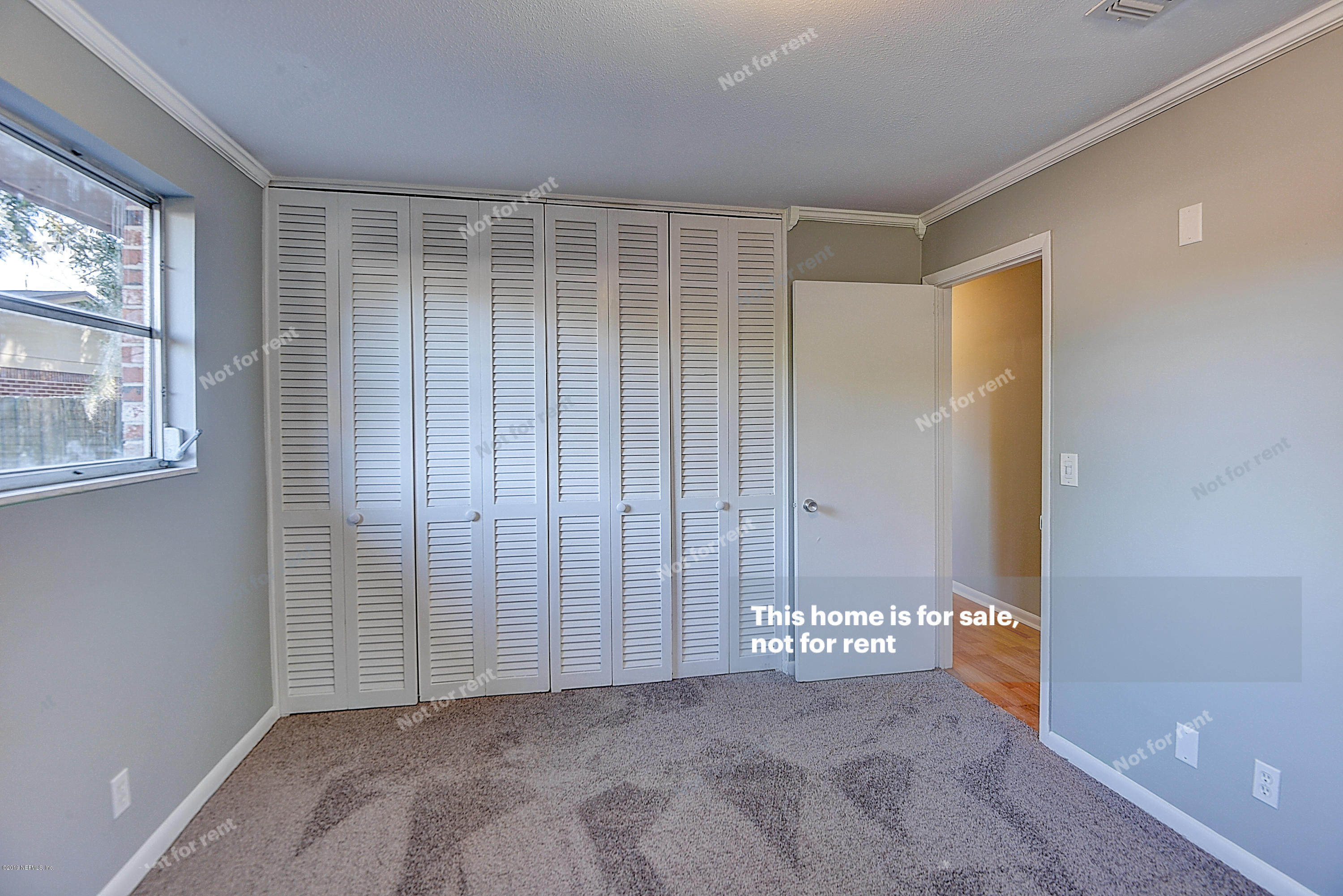 1152 Crown Drive Jacksonville, FL 32221 - Photo 20 of 31 a view of an empty room with a window