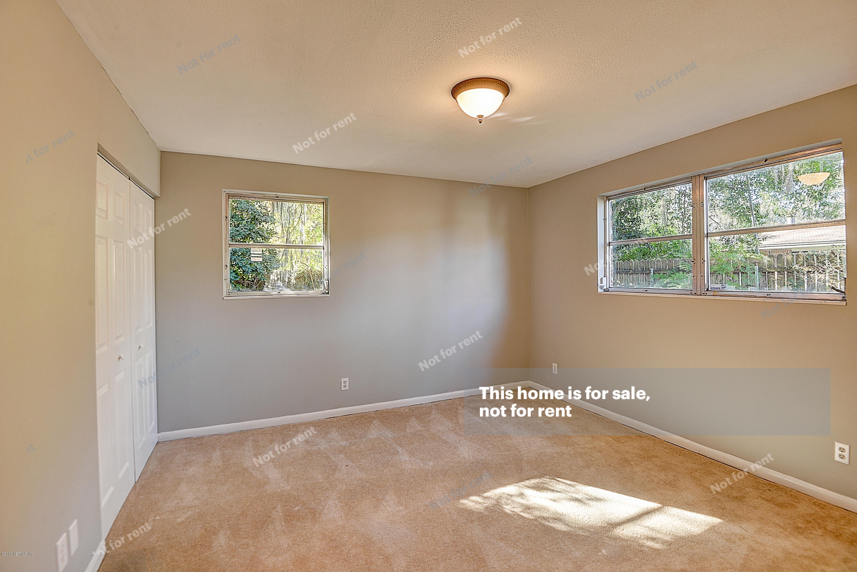 1152 Crown Drive Jacksonville, FL 32221 - Photo 5 of 31 a view of a window in an empty room