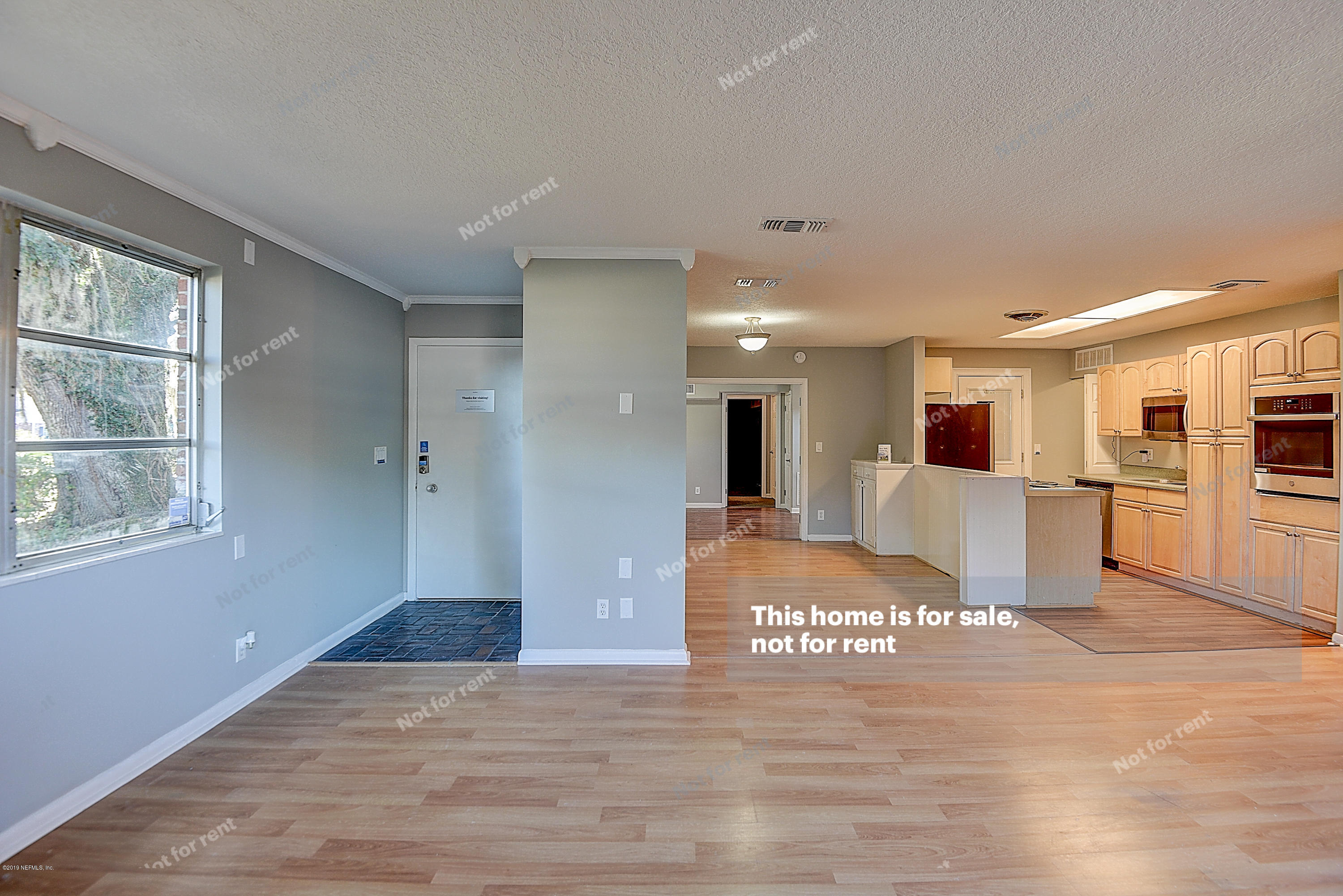1152 Crown Drive Jacksonville, FL 32221 - Photo 7 of 31 a view of a kitchen with a refrigerator