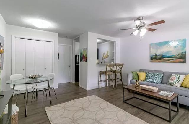 1915 Fairlawn Lane, Unit 2 Austin, TX 78704 - Photo 4 of 12 Living area with dark wood finished floors and a ceiling fan