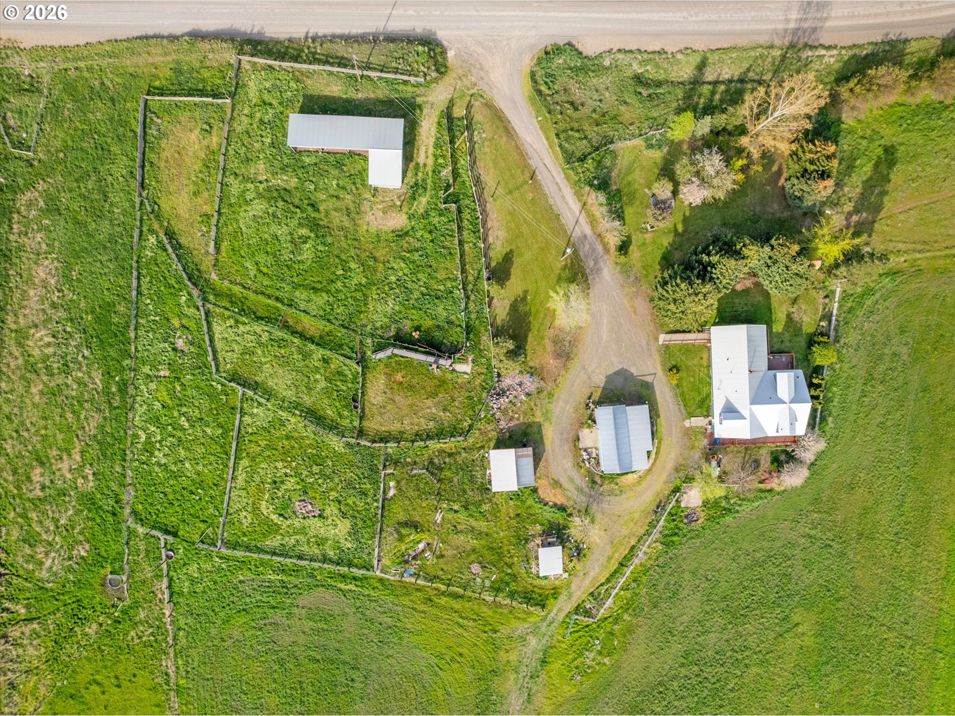 61938 High Valley Road Union, OR 97883 - Photo 16 of 46 an aerial view of a house with a yard