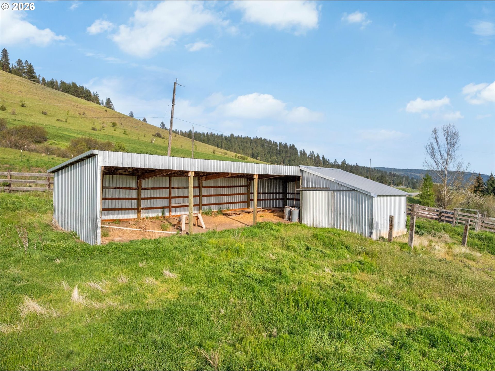 61938 High Valley Road Union, OR 97883 - Photo 18 of 46 a view of a house with a backyard