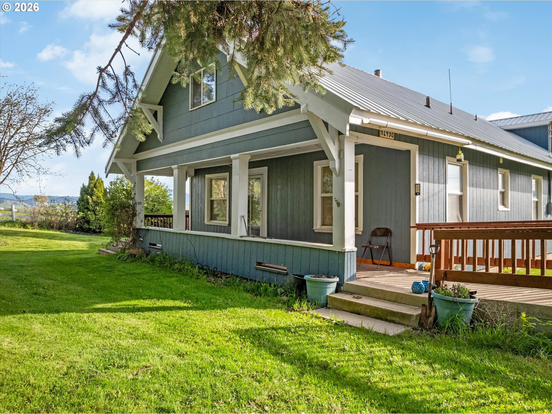 61938 High Valley Road Union, OR 97883 - Photo 26 of 46 a view of a house with a yard and sitting area