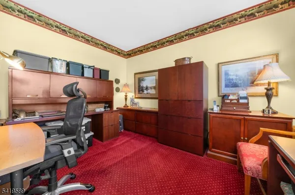 a room with furniture and wooden floor