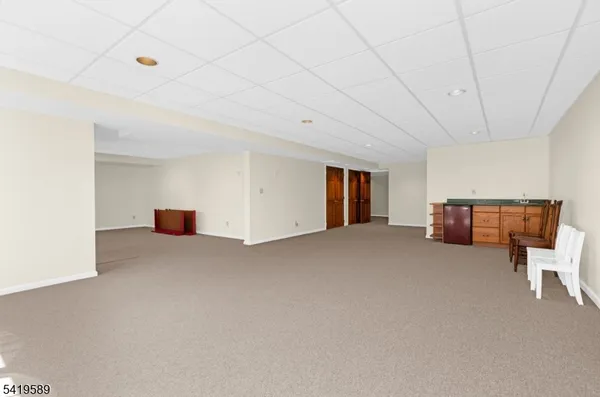 a view of empty room with windows