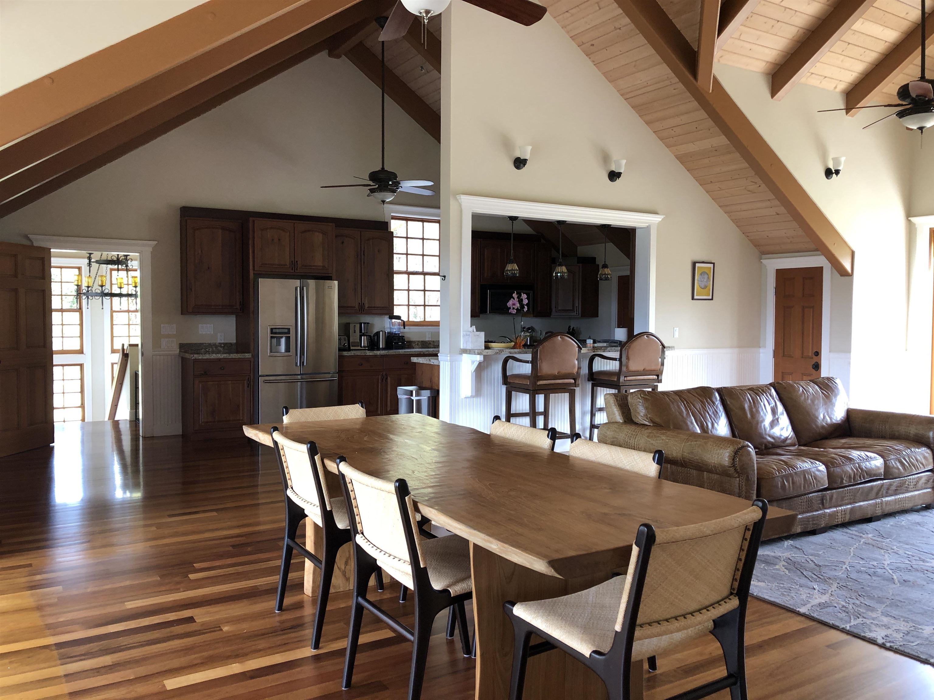 325 Waiahiwi Road Makawao, HI 96768 - Photo 7 of 30 a dining room with furniture and wooden floor