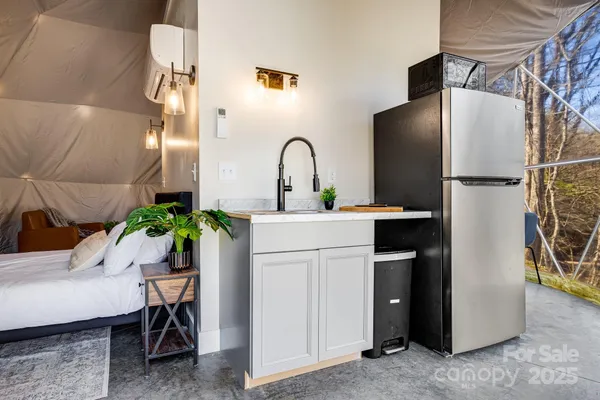 a kitchen with a sink and a stove