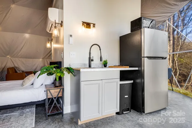 a kitchen with a sink and a stove