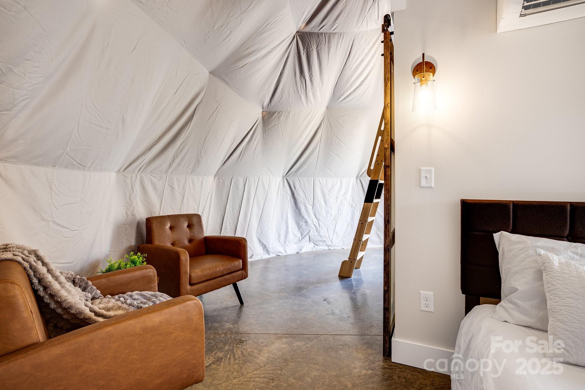 186 L Meece Road Rosman, NC 28772 - Photo 33 of 45 a living room with furniture and stairs