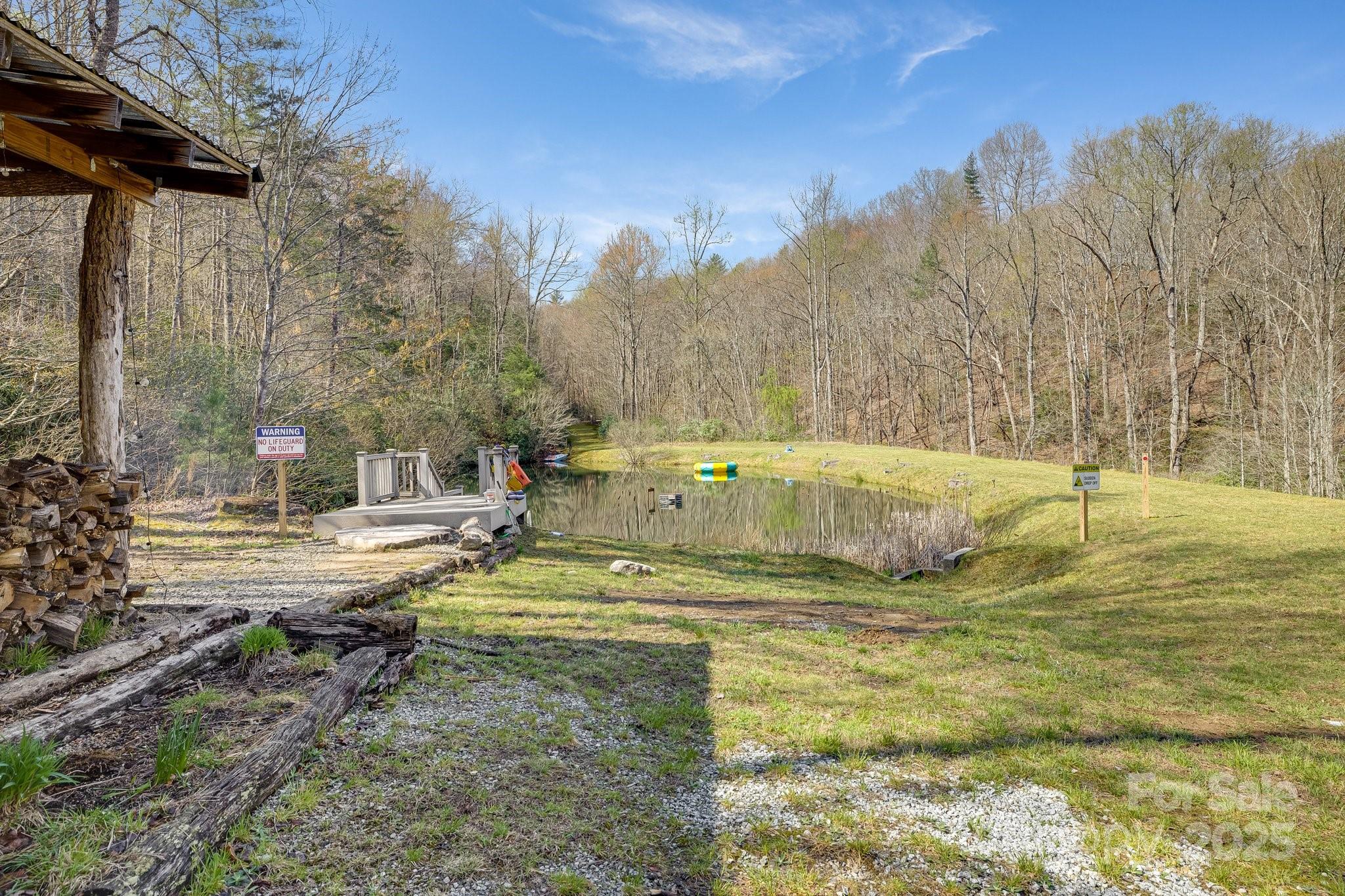 186 L Meece Road Rosman, NC 28772 - Photo 39 of 45 a view of a yard with swimming pool