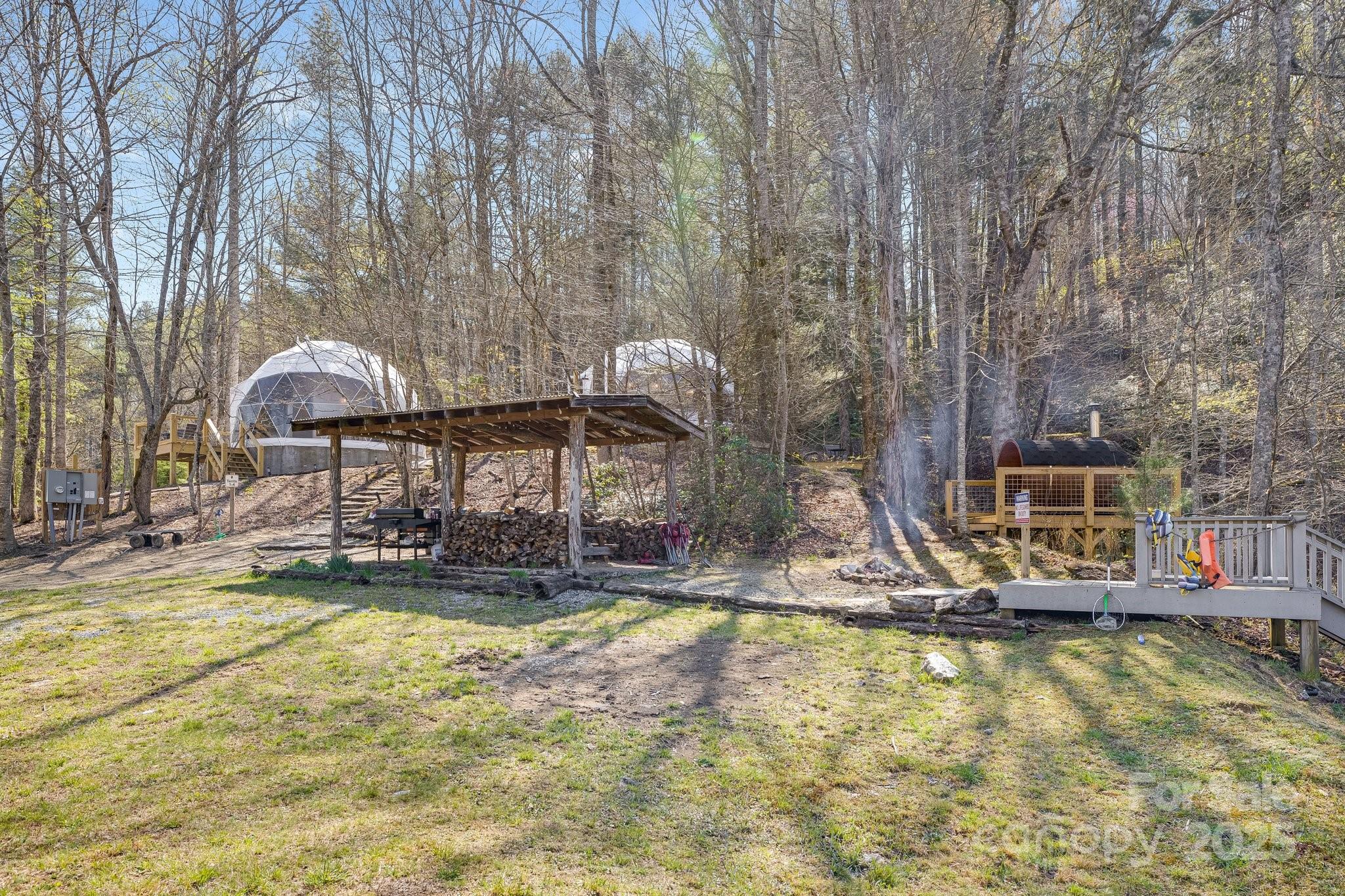 186 L Meece Road Rosman, NC 28772 - Photo 40 of 45 a swimming pool with outdoor seating yard and barbeque oven