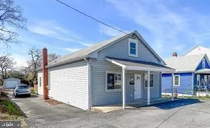 a front view of a house with a garage