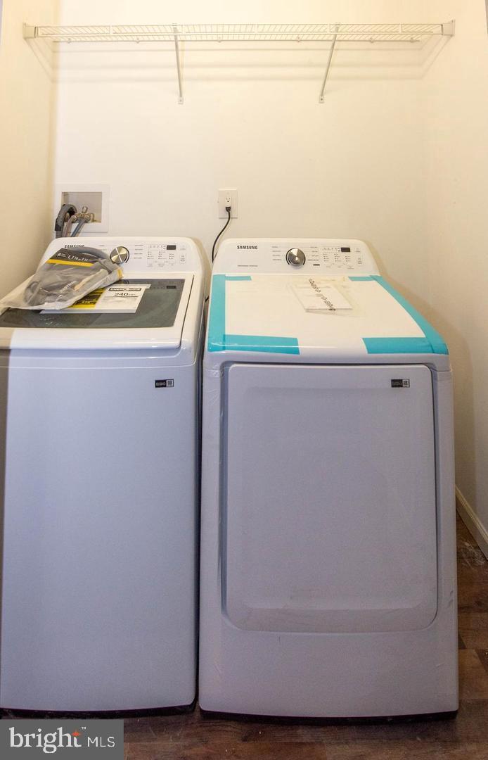 913 Wise Avenue Baltimore, MD 21222 - Photo 6 of 11 a utility room with dryer and washer