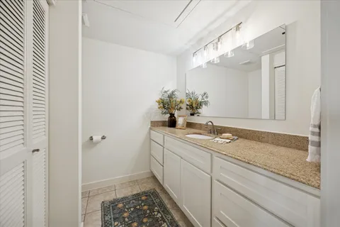 a view of a balcony with wooden floor
