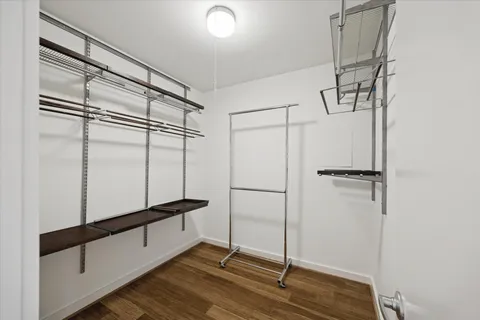 a view of a swimming pool with a yard