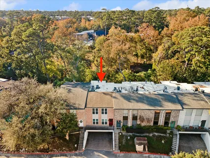 a view of a swimming pool with a yard