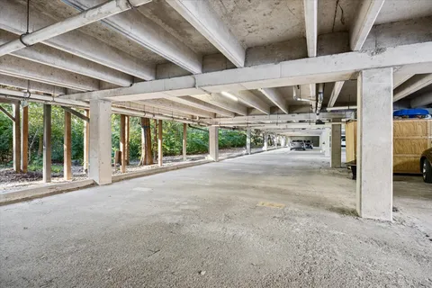 a view of a park with large trees