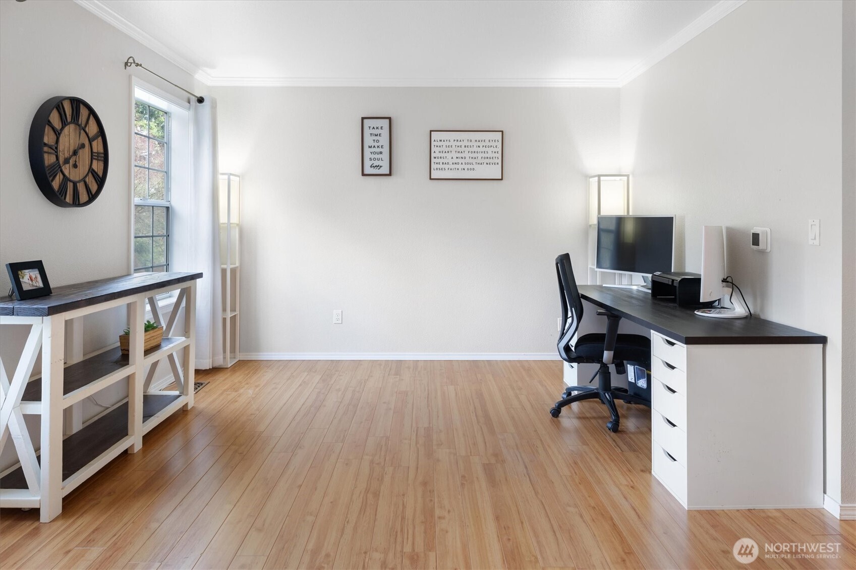 17018 45th Street East Lake Tapps, WA 98391 - Photo 13 of 40 a view of a workspace with furniture and wooden floor