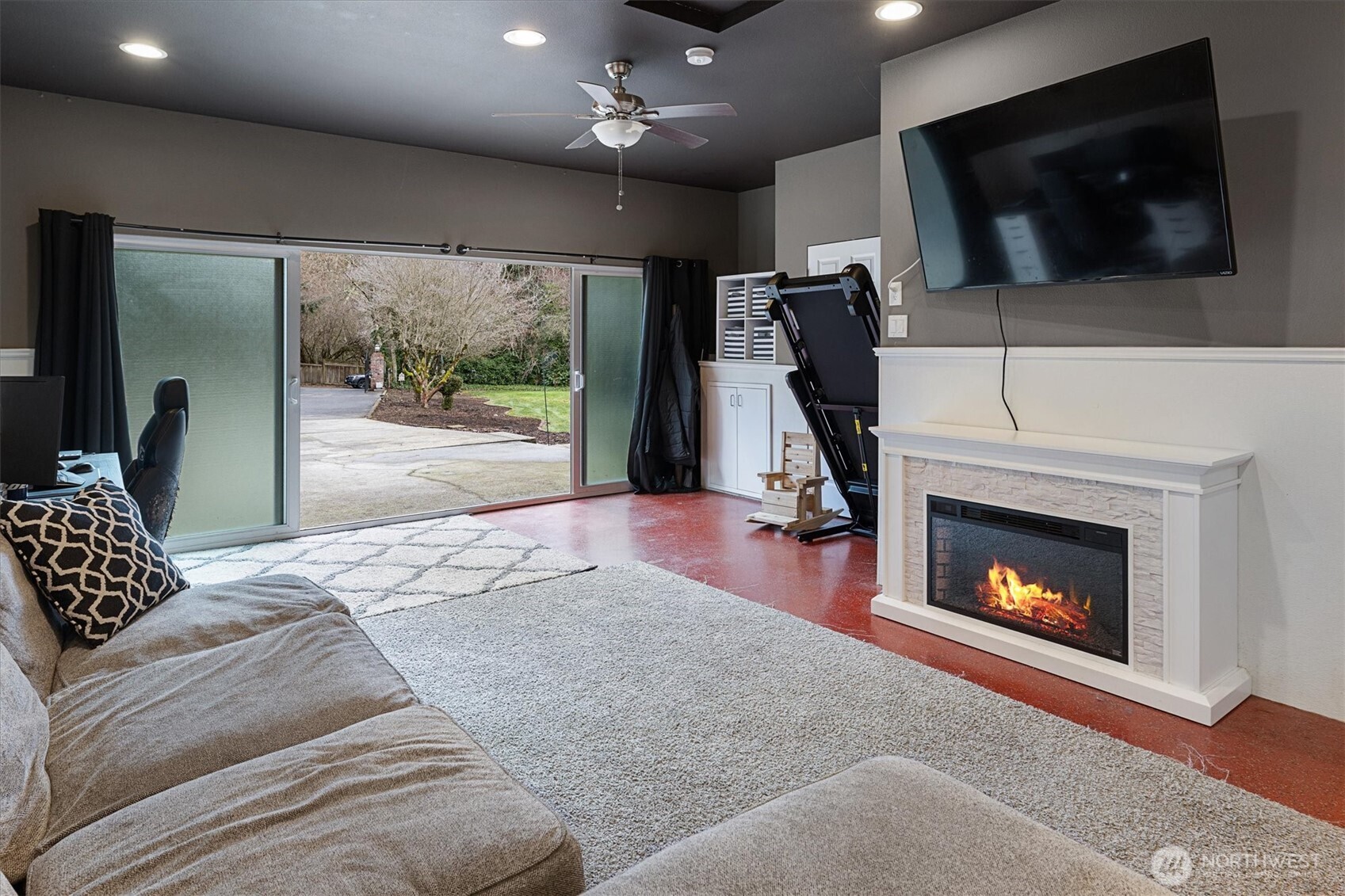 17018 45th Street East Lake Tapps, WA 98391 - Photo 16 of 40 a bedroom with a bed and a fireplace