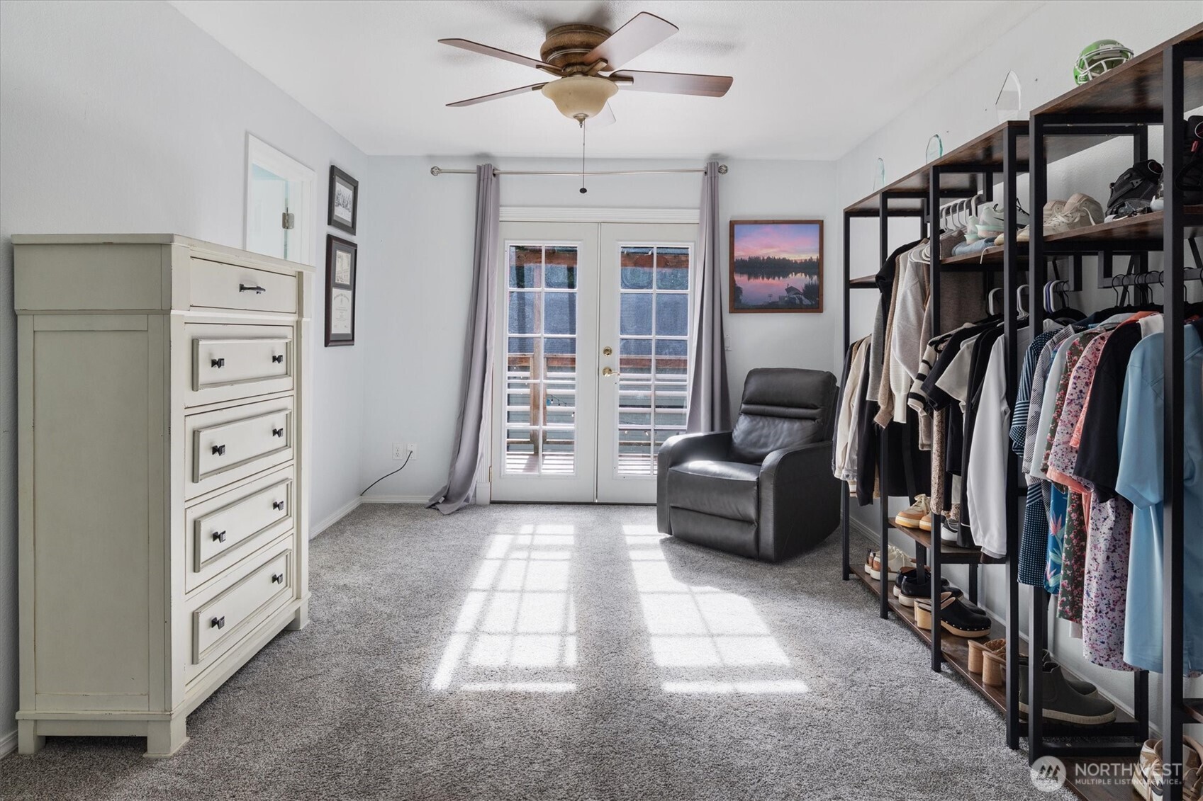 17018 45th Street East Lake Tapps, WA 98391 - Photo 22 of 40 a bedroom with furniture and a large window